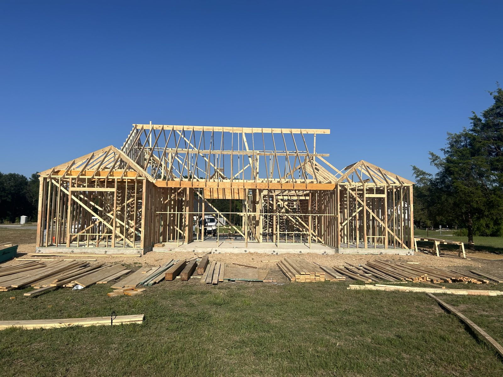 Front of the framed home with gables